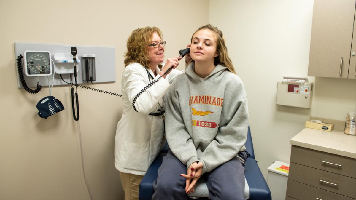 Student getting a medical exam at University Health Care.