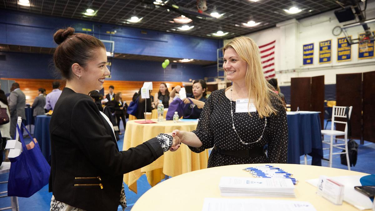 Student interviewing with a potential employer.