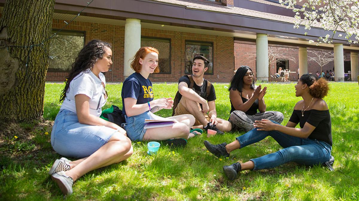 Students meeting on the lawn in front of Mortola Library