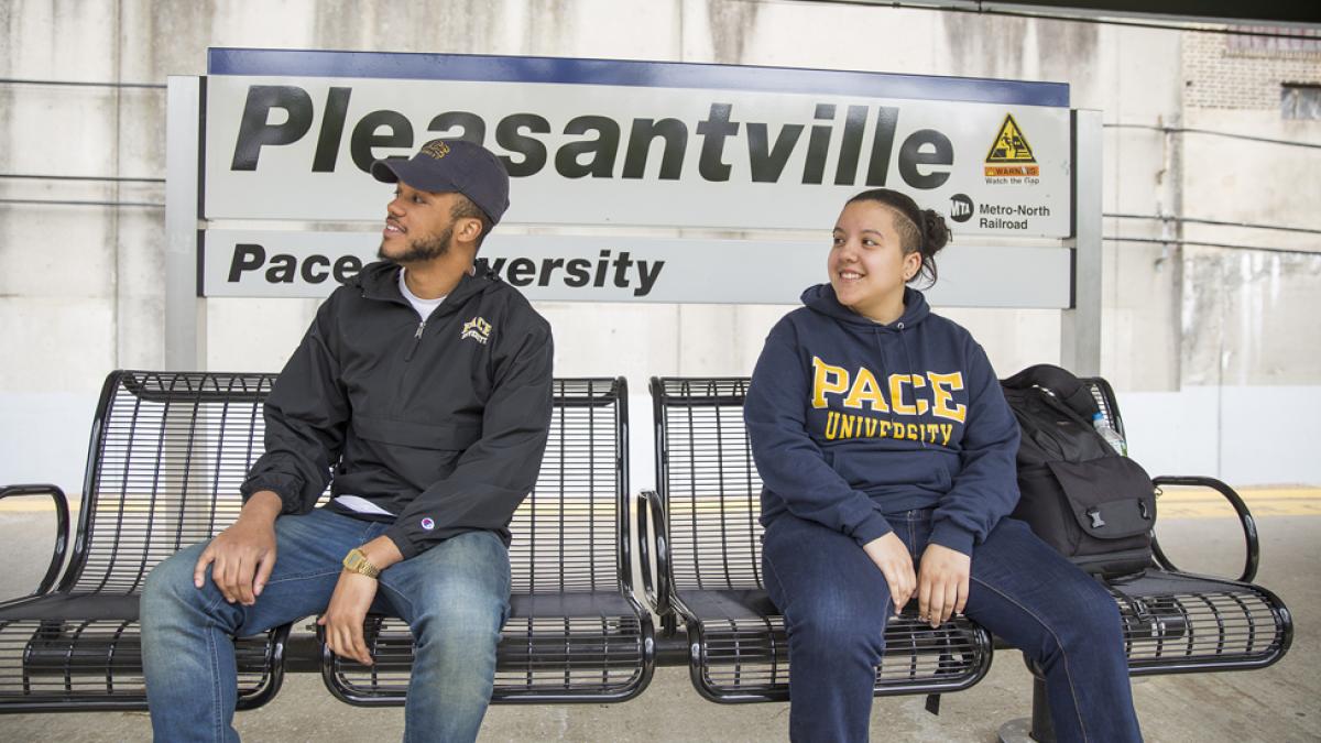 Students waiting for the train at the Pleasantville train station.