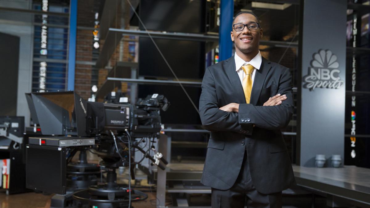 Pace student at his internship with NBC.