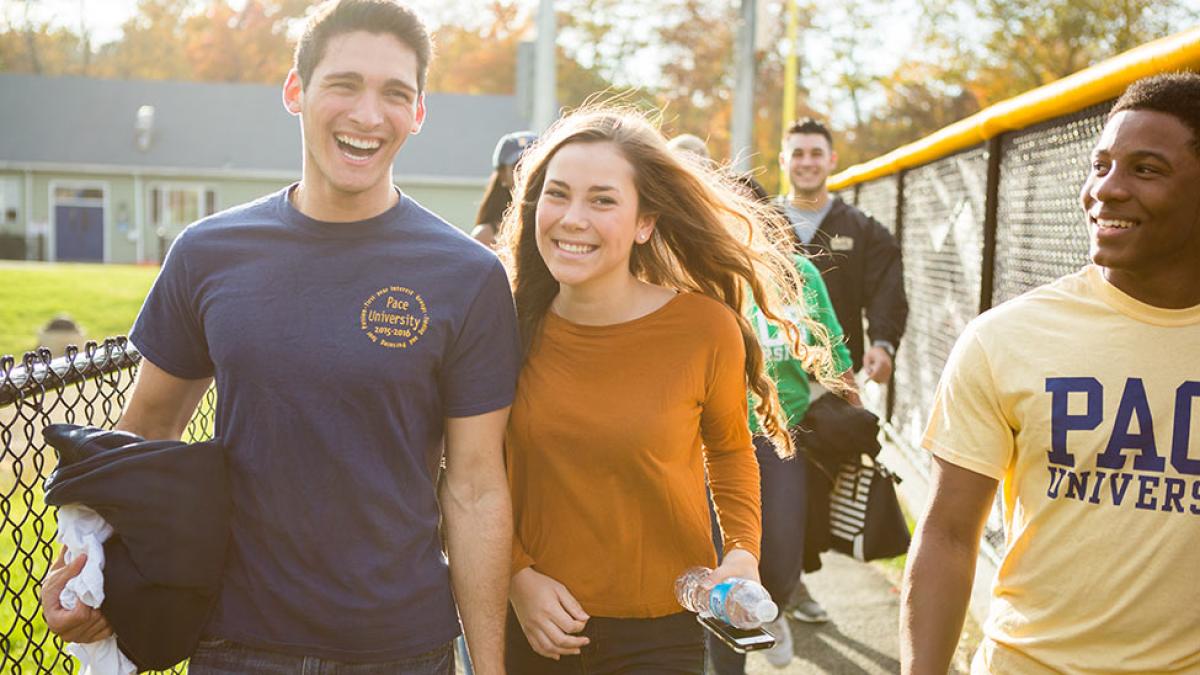 Group of students smiling at the camera.