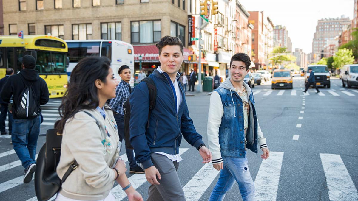 Students crossing a road in NYC.