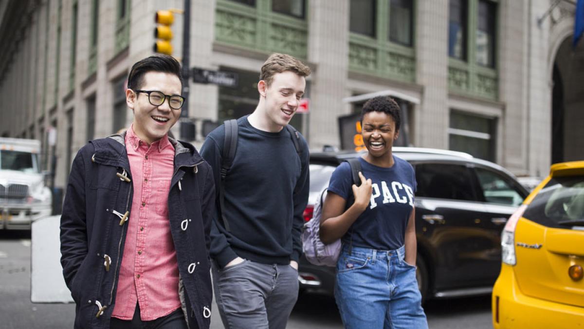 Group of students walking around NYC.
