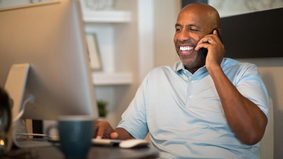 Student receiving IT support over the phone.