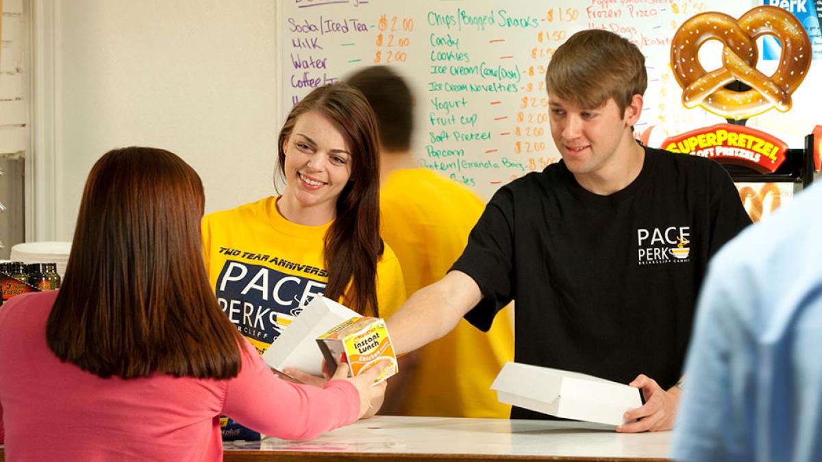 Students working at the Pace Perk cafe on the Westchester campus.