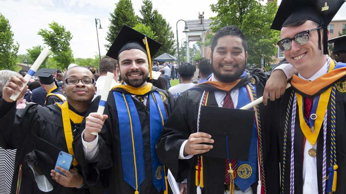 Group of male students at commencement