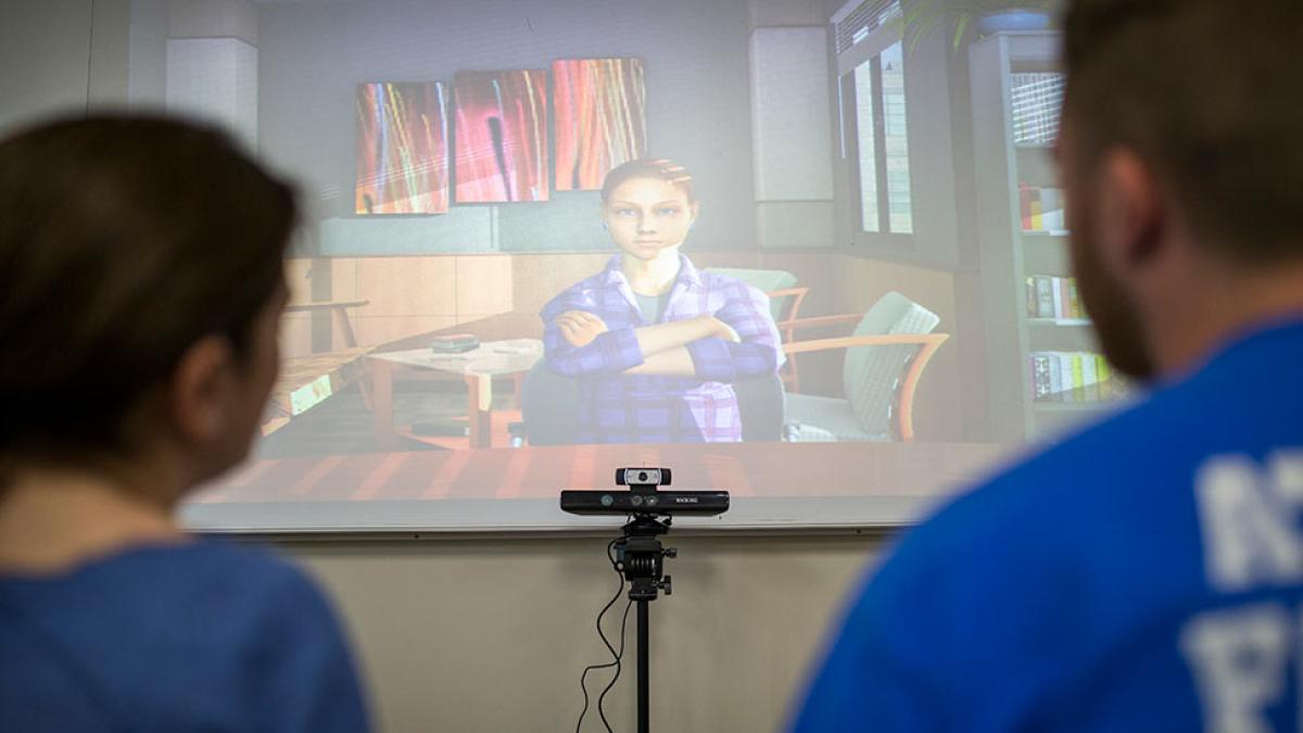 School of Education students working with an avatar in the simulation lab.