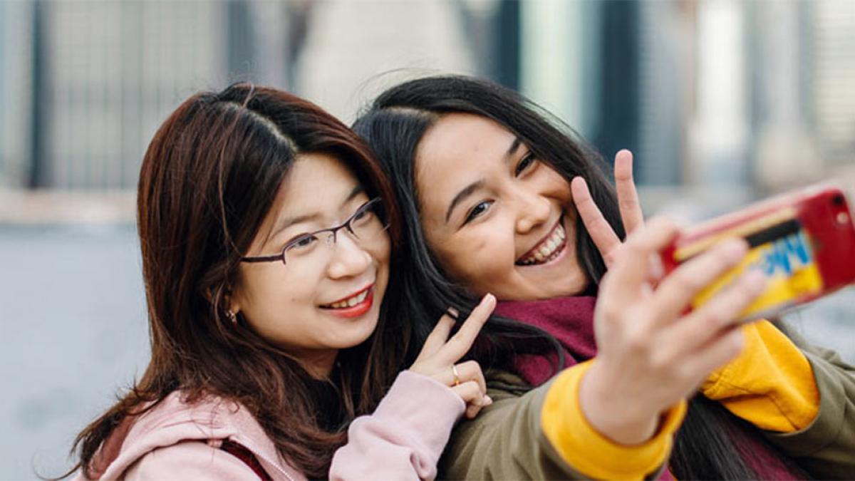 Two female students posing for a selfie.