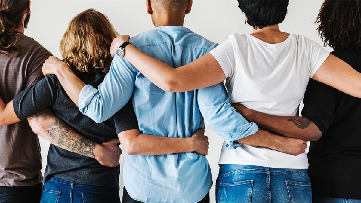 people holding one another