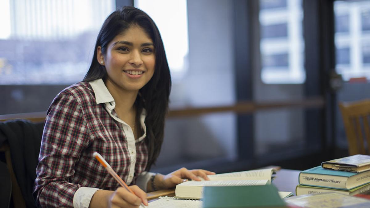 Famale pace student studying