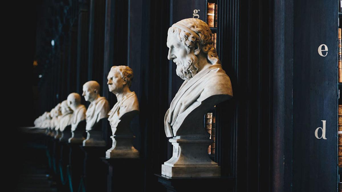 Busts of historical figures in a library