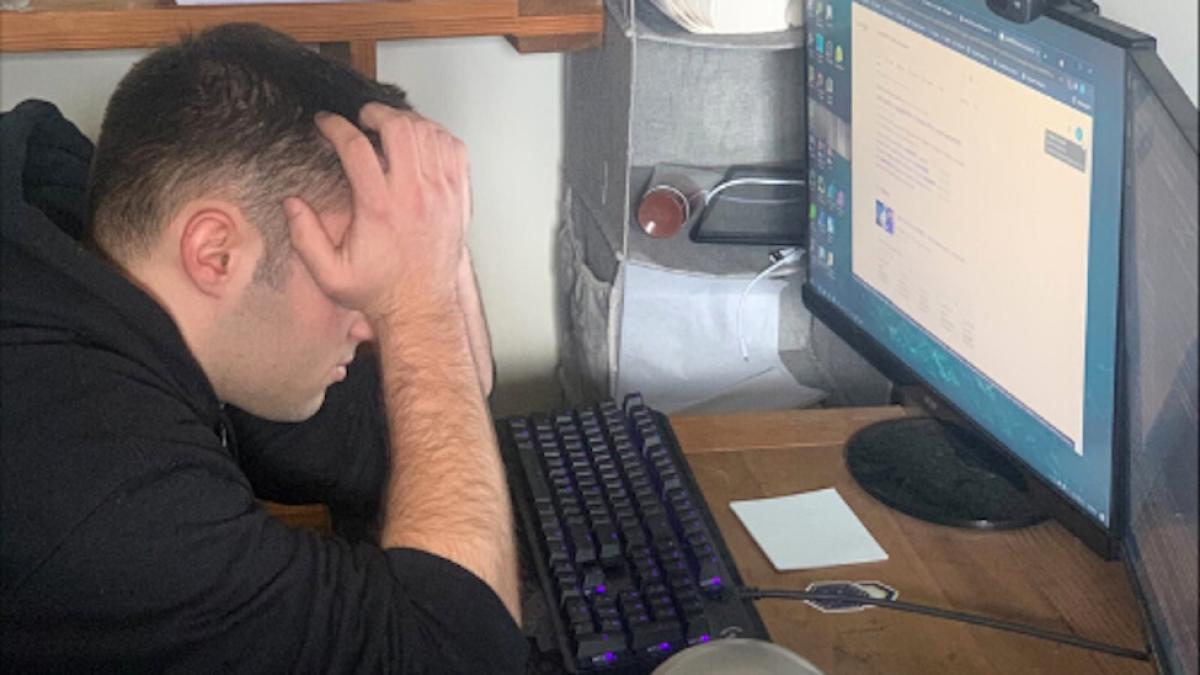 Andrew working on his computer
