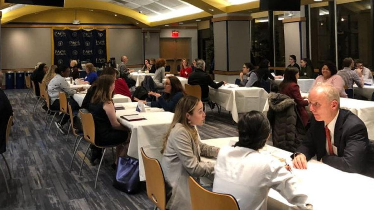 Students at a speed round of interview event