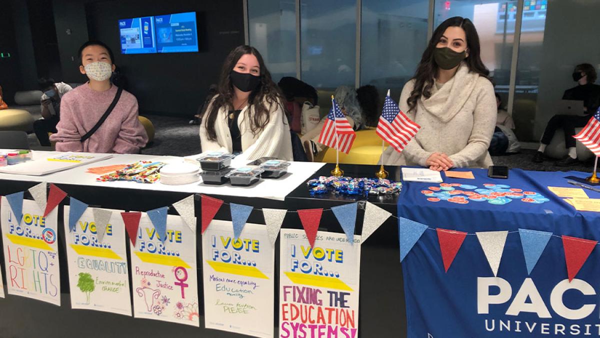 Students hosting a tabling event to register voters