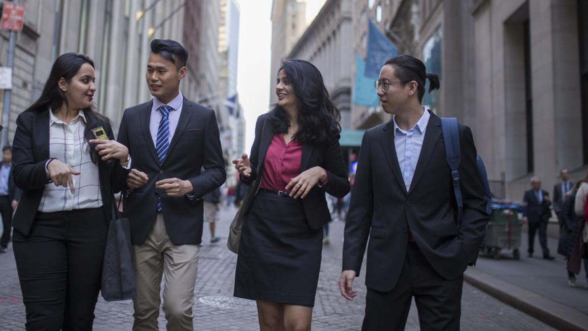 Lubin graduate students walking in Lower Manhattan near the New York City Campus