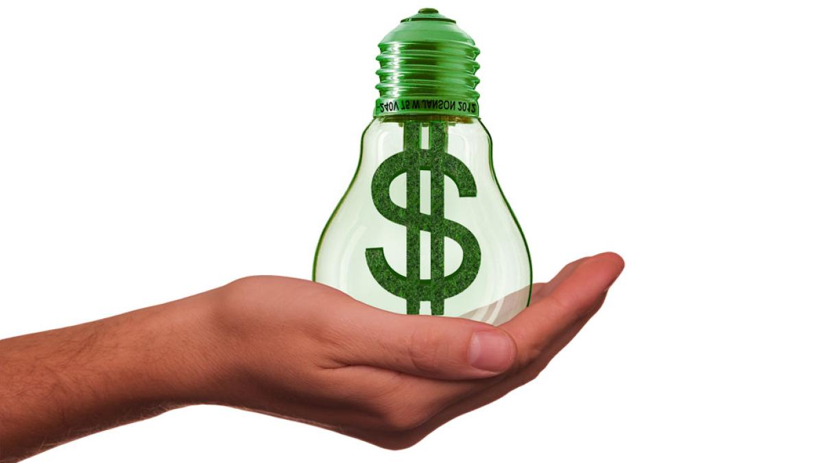 graphic of green light bulb and dollar bill representing 'sustainable investing'