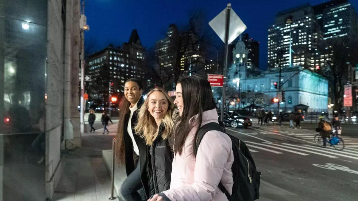 Female students going through the doors of 41 Park Row