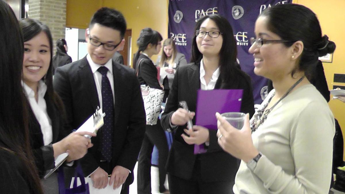 accounting students networking at an event at One Pace Plaza, New York City Campus