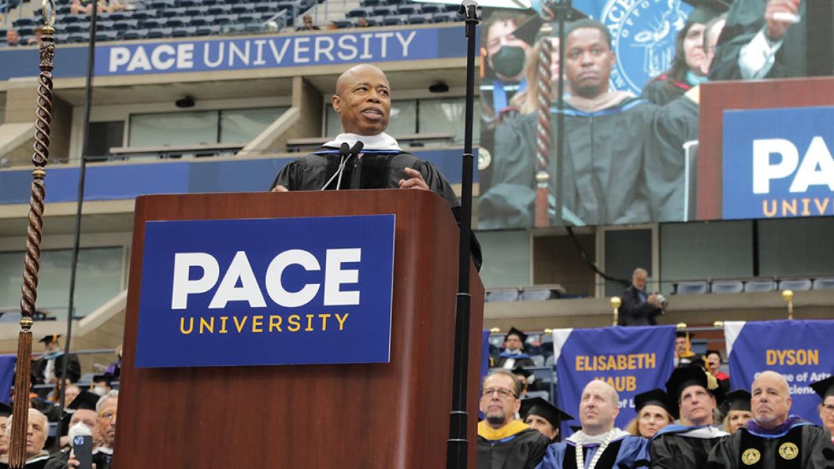 NYC Mayor Eric Adams addressing the crowd at the Pace University Commencement ceremony.