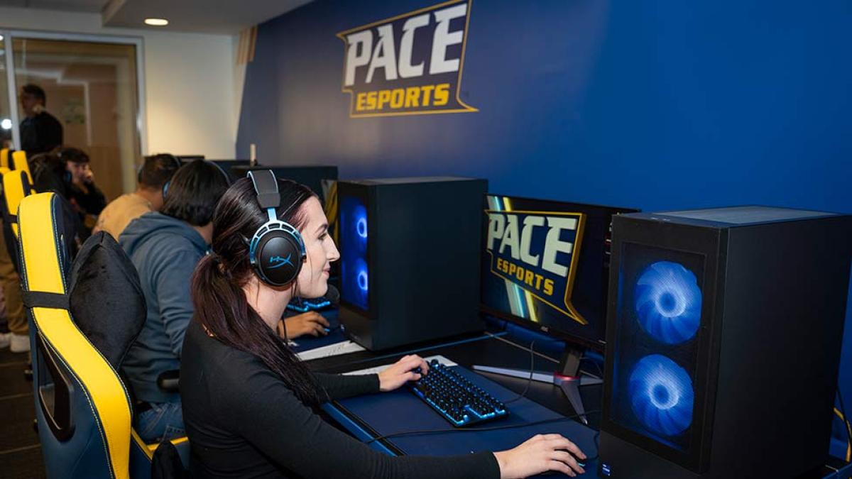Pace student playing video games at the university eSports Arena.