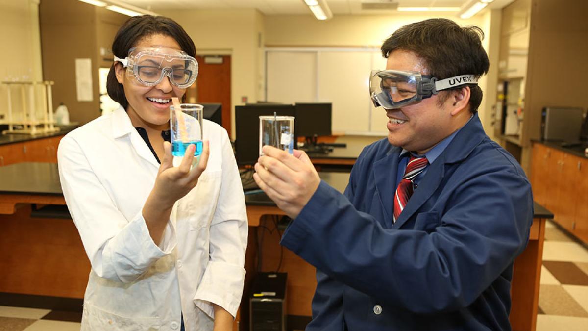 student and professor in chemistry lab