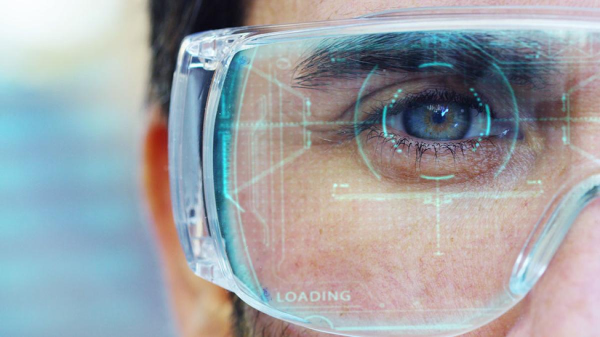 close up of an eye with augmented reality glasses