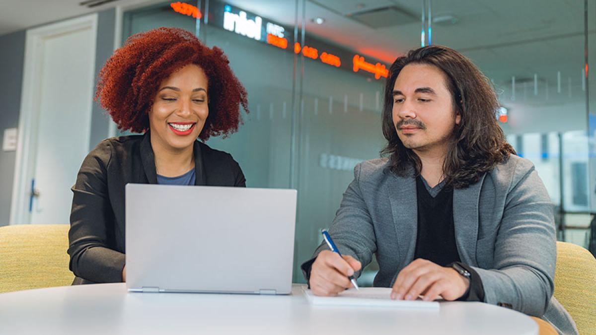 Two Pace graduate students studying