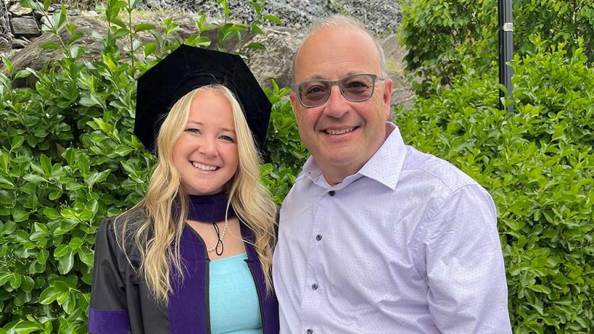 Graduation photo of Alexis Epstein '21 with father Steven Epstein '92