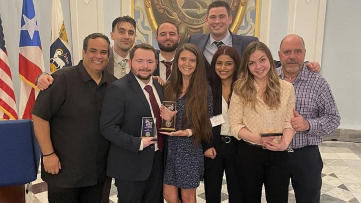 Pictured, from L to R: Carlos Concepción, Joseph Russo, Daniel Petrillo, Andre Ingenito, Giuliana Trivella, Phillip O’Meara, Krittika ‘Kye’ Shah, Alina Rizhinashvili, and Louis Fasulo