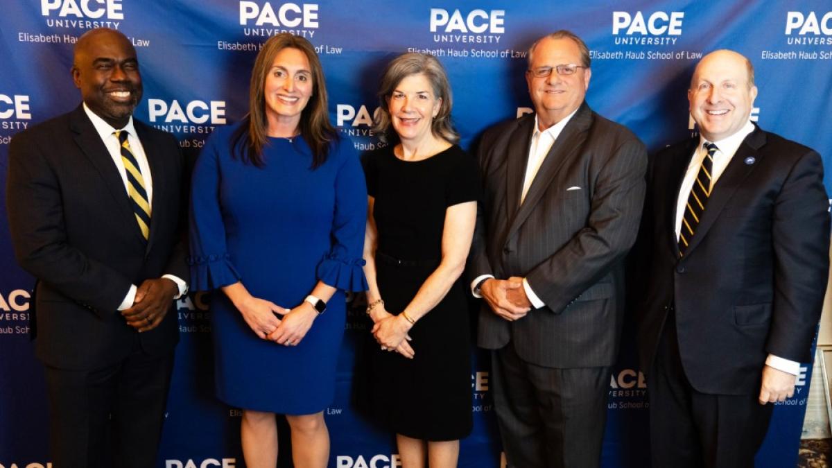 Five adults pictured at the Annual Law Leadership Dinner