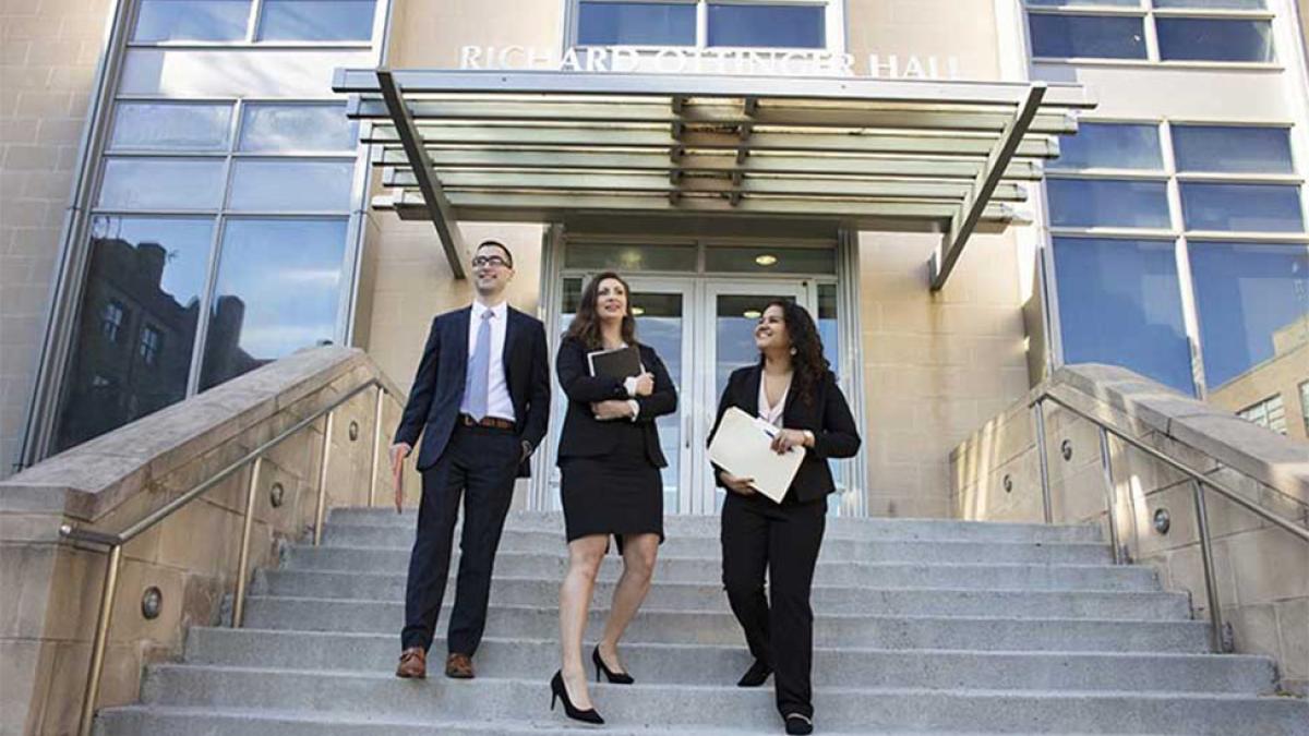 students walking down steps on Elisabeth Haub School of Law campus