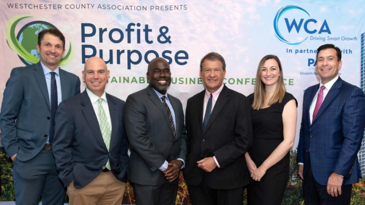 Six individuals from Elisabeth Haub School of Law pictured at the 2023 Sustainable Business Conference