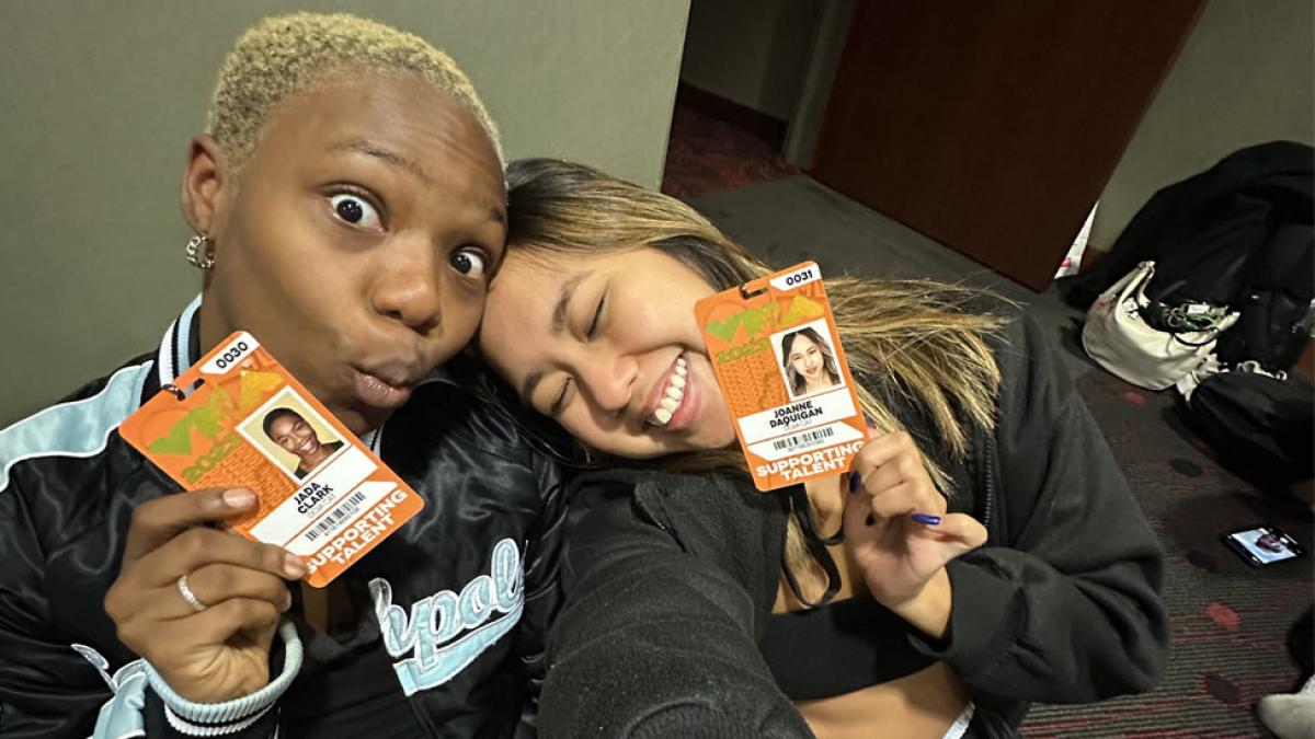two pace students taking a selfie with their VMA ID badges. 