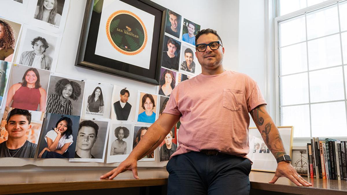 jesse carlo in his office posing for the camera