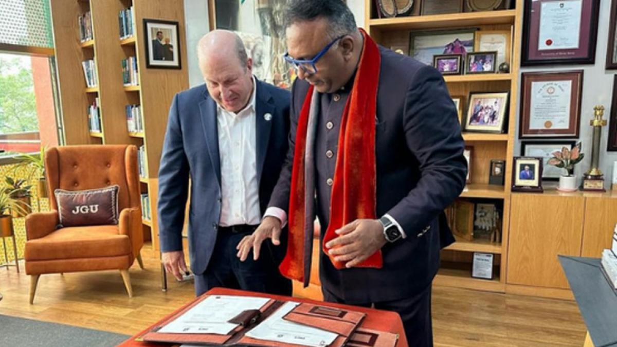 President Krislov at OP Jindal University signing a memorandum of understanding. 