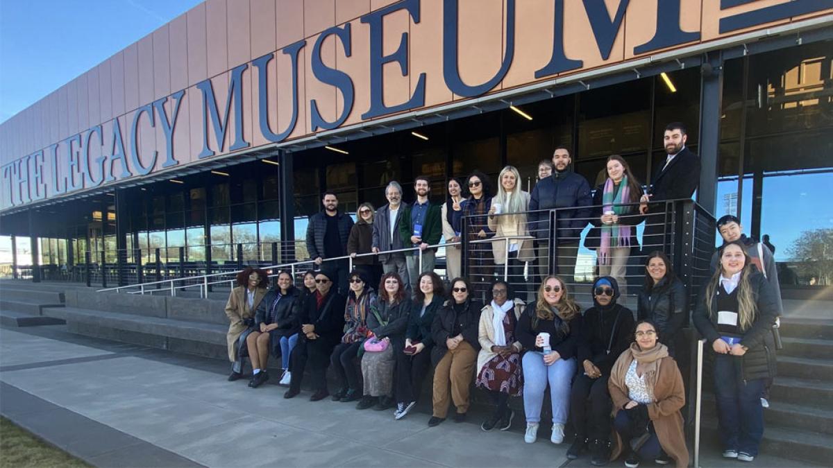 Pace students and faculty posing for the camera at the Legacy Museum. 