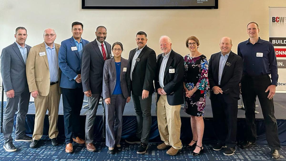 Group photo that includes attendees at the Conference on Artificial Intelligence in Cybersecurity.