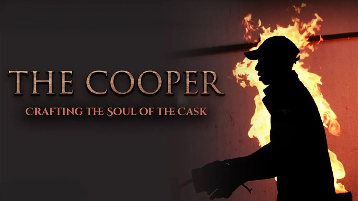 Poster for The Cooper: The Art of the Cask documentary produced by PaceDocs in the Media, Communications, and Visual Arts department with a man silhouetted by fire