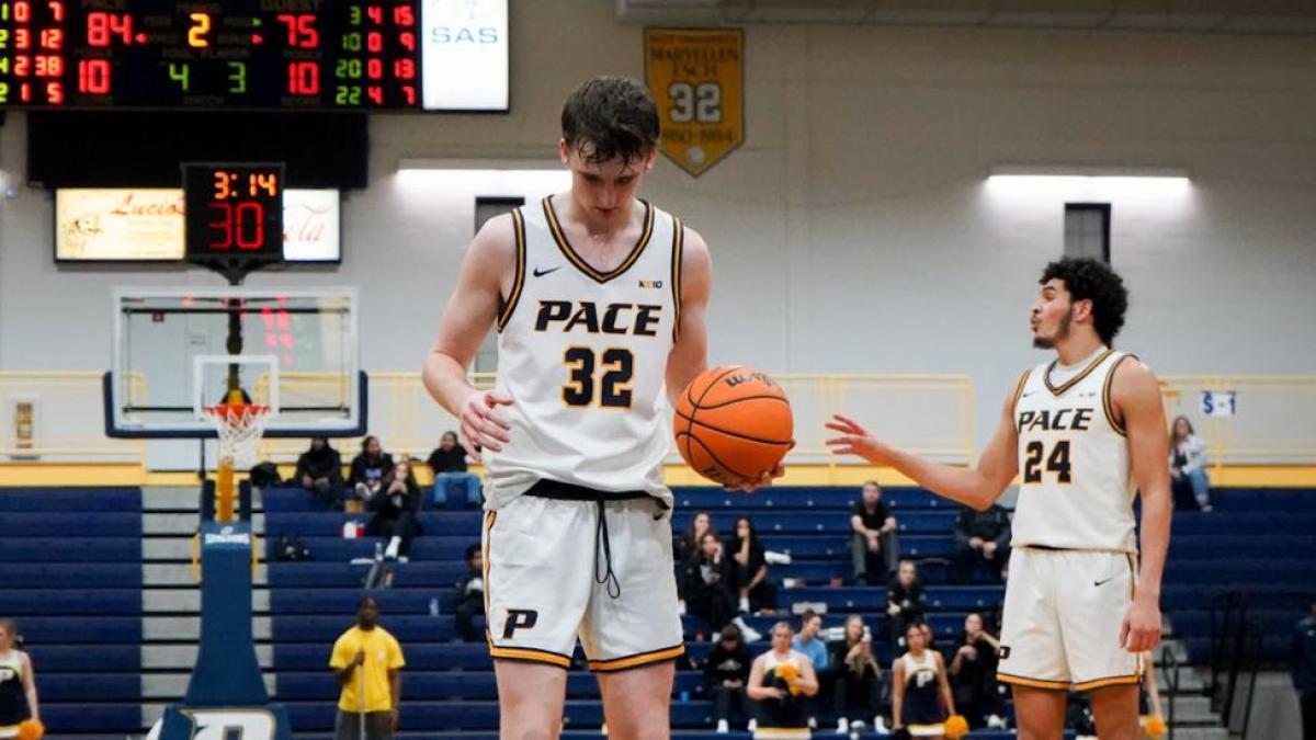 Pace University student Just O'Neill preparing to take a free throw at a basketball game for Pace's Men's Basketball team.