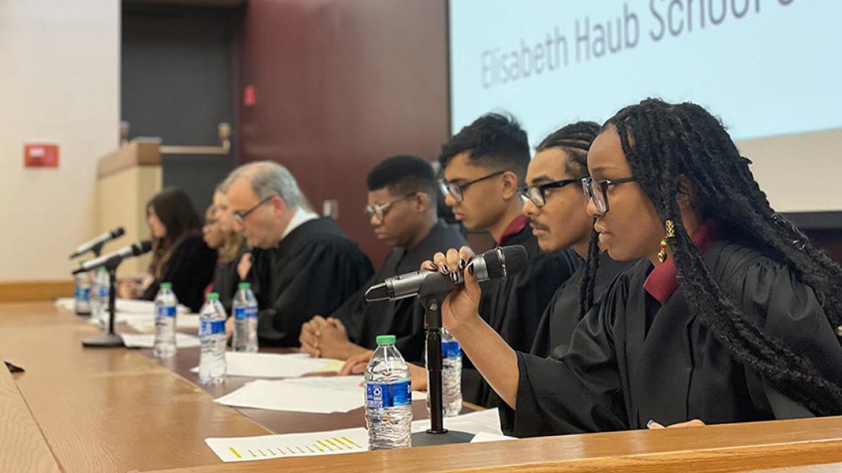 Lawyers and Professors speaking at a panel
