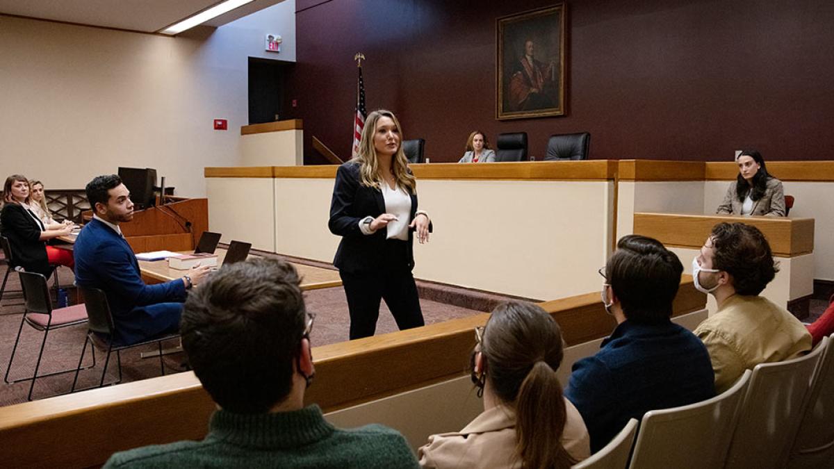 Students competing in a courtroom at the ICC Moot Court Competition