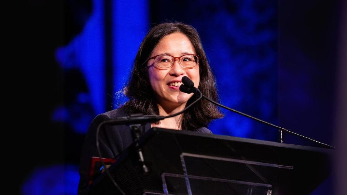 Interim Dean of the Seidenberg School of CSIS at Pace University, Dr. Li-Chiou Chen, standing in front of a podium and giving a speech.