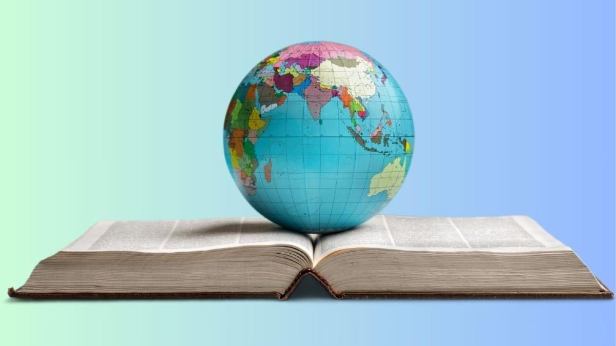 Globe on an open book for a presentation by Pace University School of Education