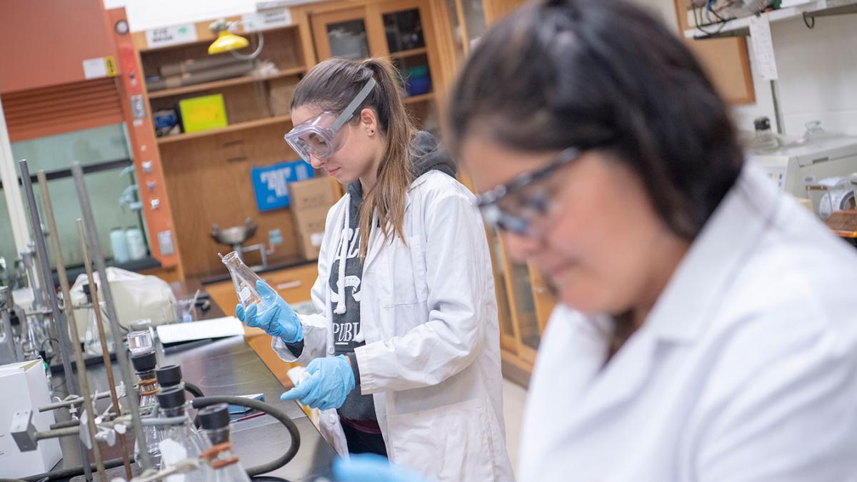 Pace University students working in a lab.