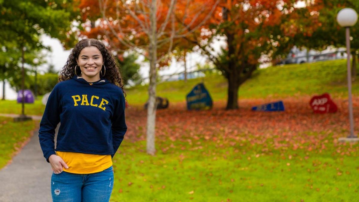 Pace University student with a park in the background
