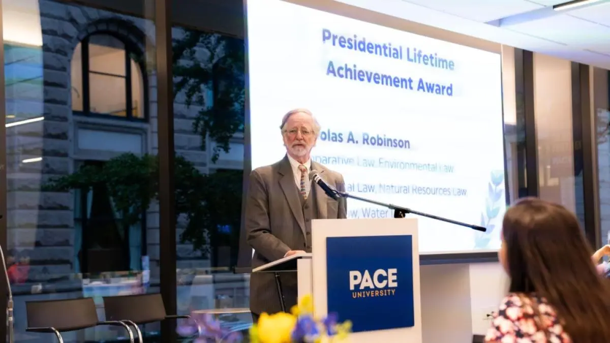 Haub Law Professor Nicholas A. Robinson addressing award ceremony audience