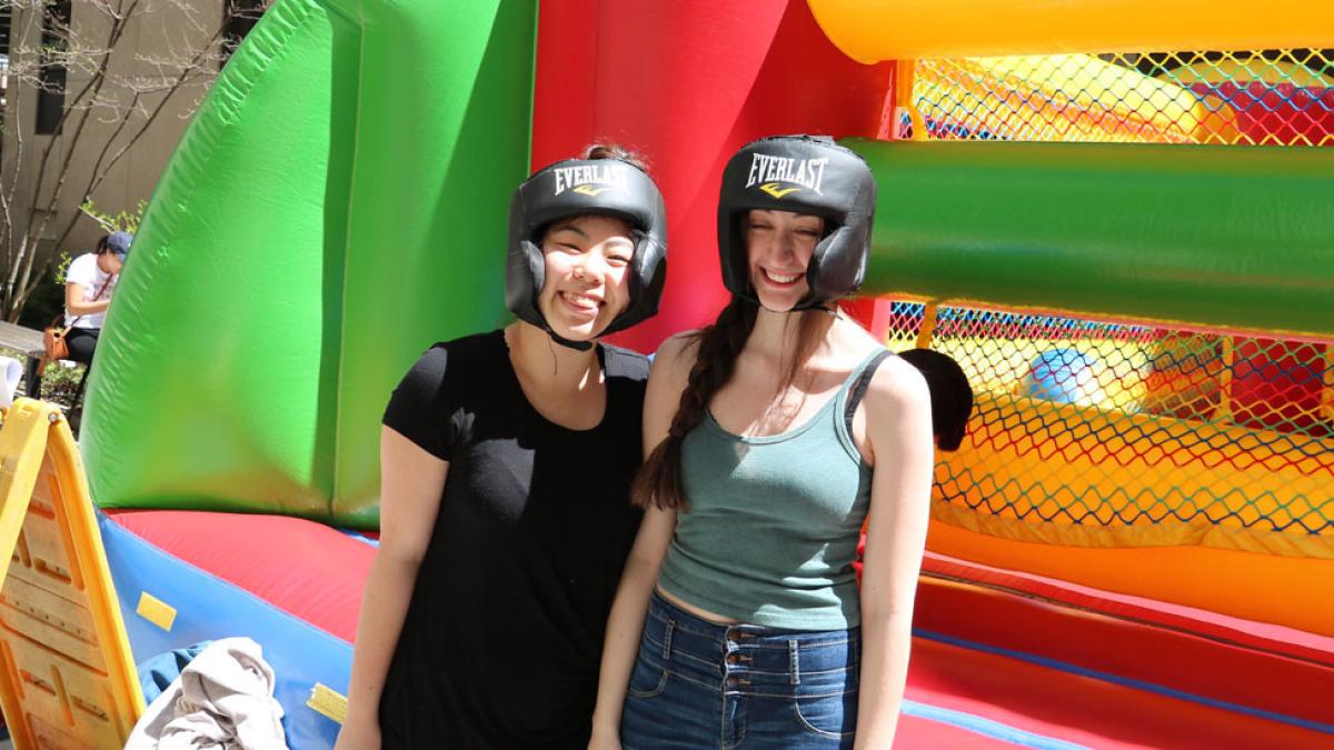 Pace students wearing bounce-house boxing headgear.