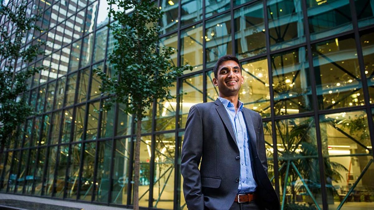 Lubin School of business student standing in front of an office building