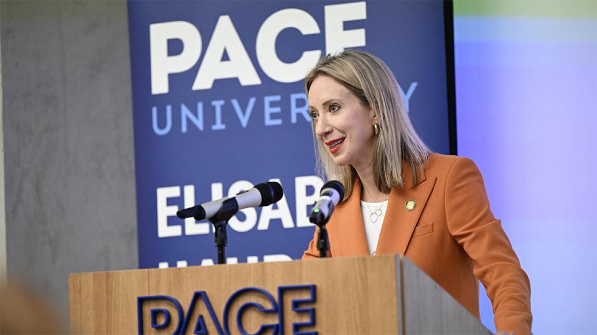 Elisabeth Haub School of Law at Pace University Tucker Prize awardee Lucy Lang speaking at podium